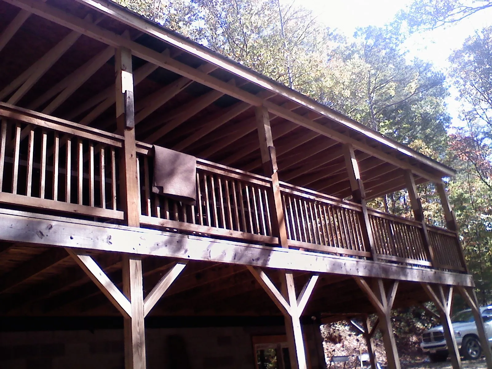 Timber framing under a new elevated porch and deck — Roof Leak Repair in Idaho City by Roofing Brothers